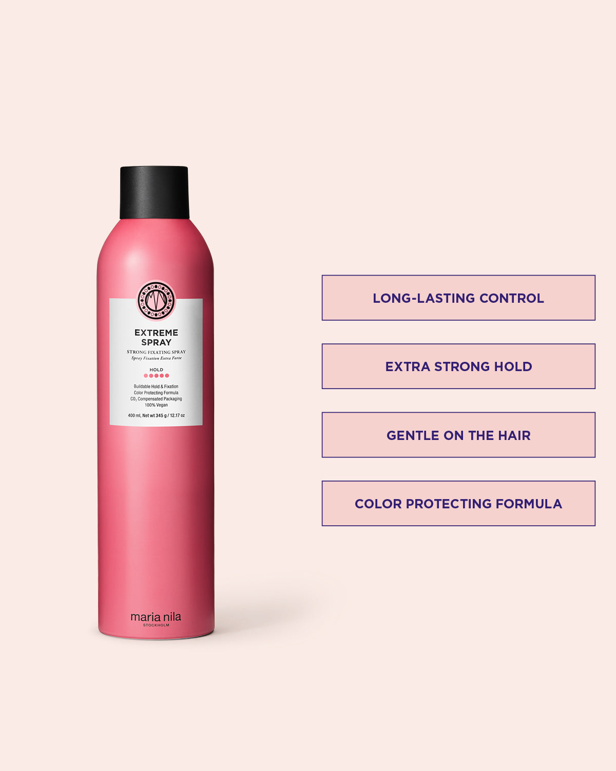 Pink hair spray bottle with text on a light pink background