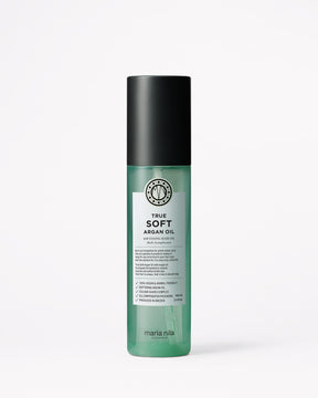 Bottle of Maria Nila True Soft Argan Oil on a white background
