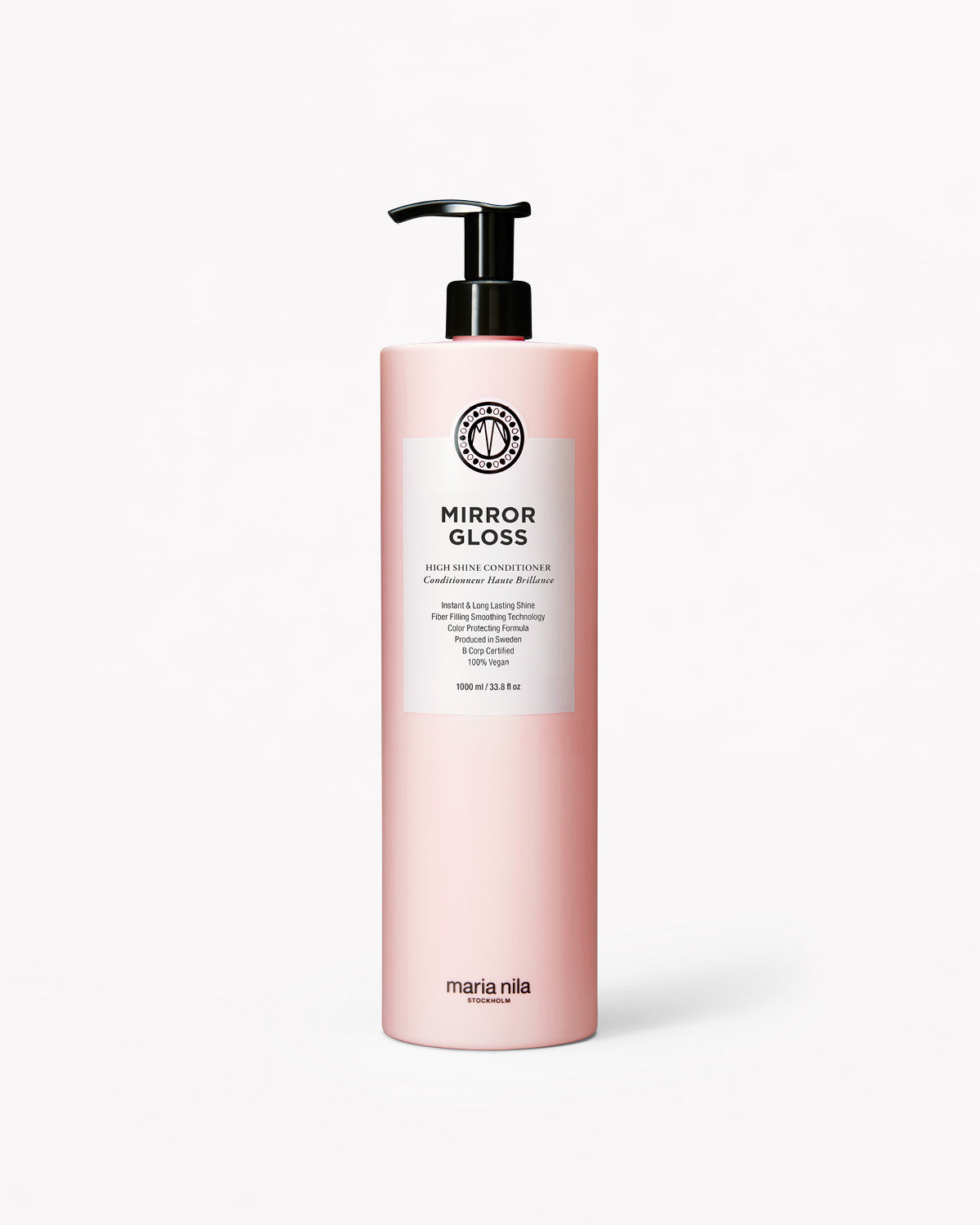 Pink bottle of Maria Nila Mirror Gloss Conditioner on a white background