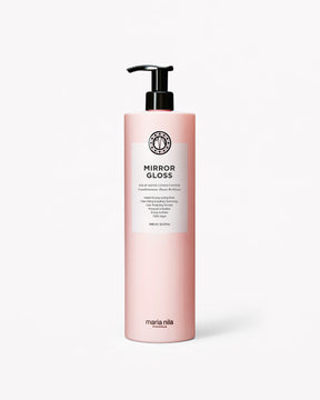 Pink bottle of Maria Nila Mirror Gloss Conditioner on a white background