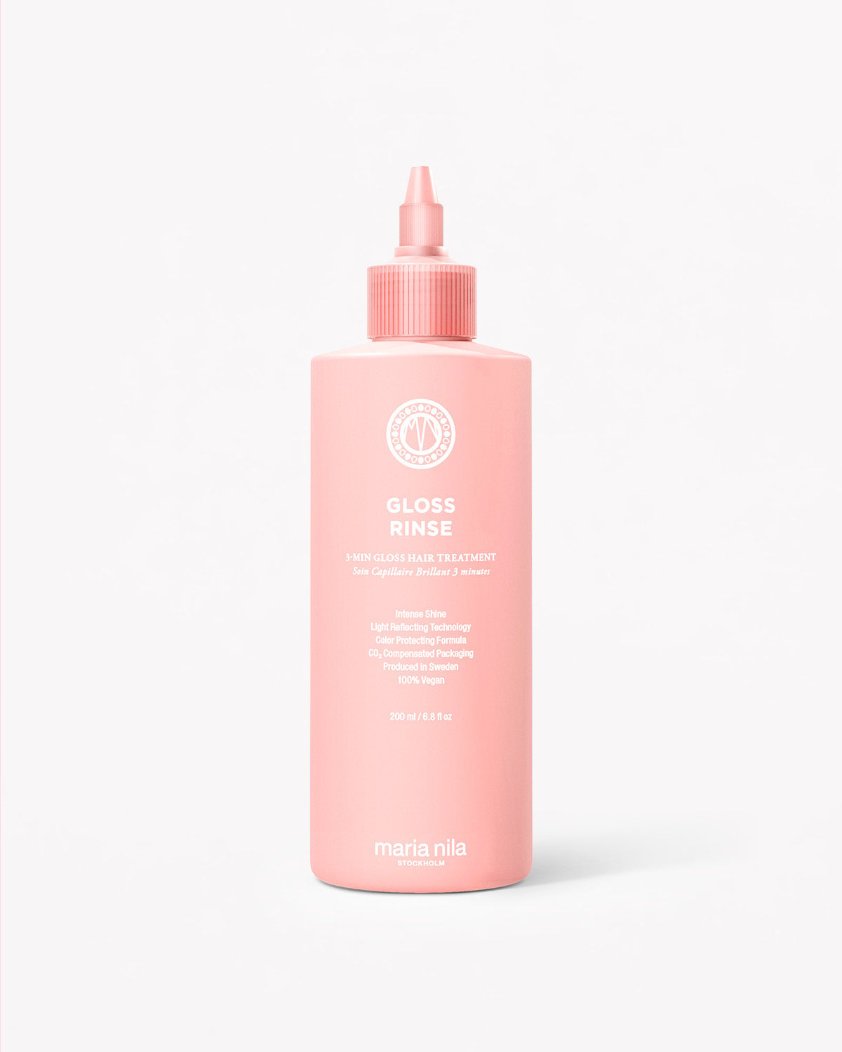 Pink bottle of Maria Nila Gloss Rinse on a white background