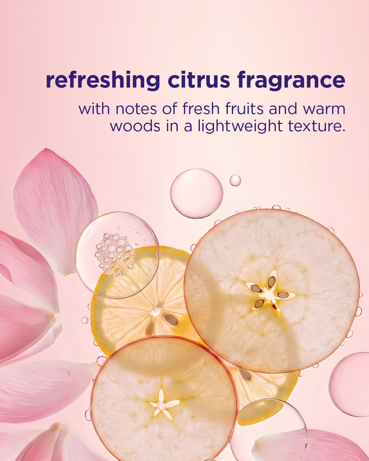 Sliced apples and pink flowers with a refreshing citrus fragrance description on a pink background