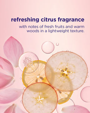 Sliced apples and pink flowers with a refreshing citrus fragrance description on a pink background